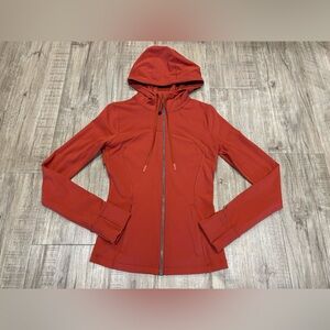 Lululemon Hooded Define Jacket Nulu
Cayenne size 4 body skimming fitted gym yoga